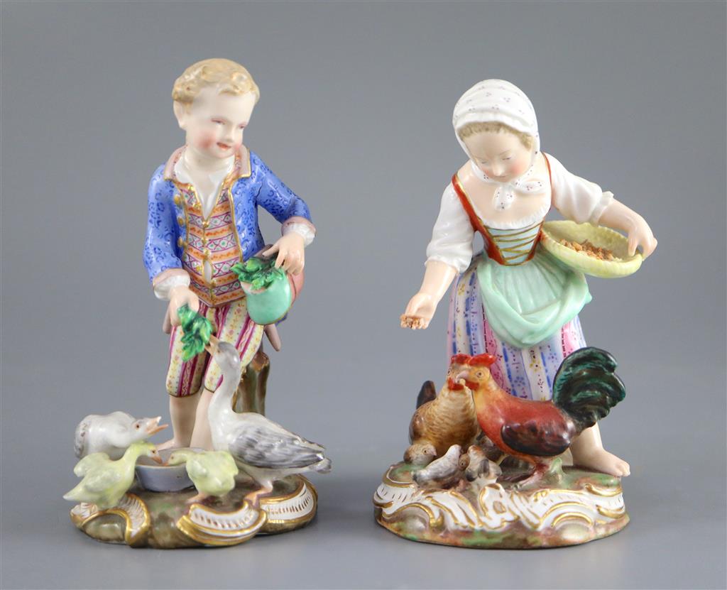 A pair of Meissen figures after the 18th century models of children feeding geese and chickens, 19th century, 12cm and 13cm high